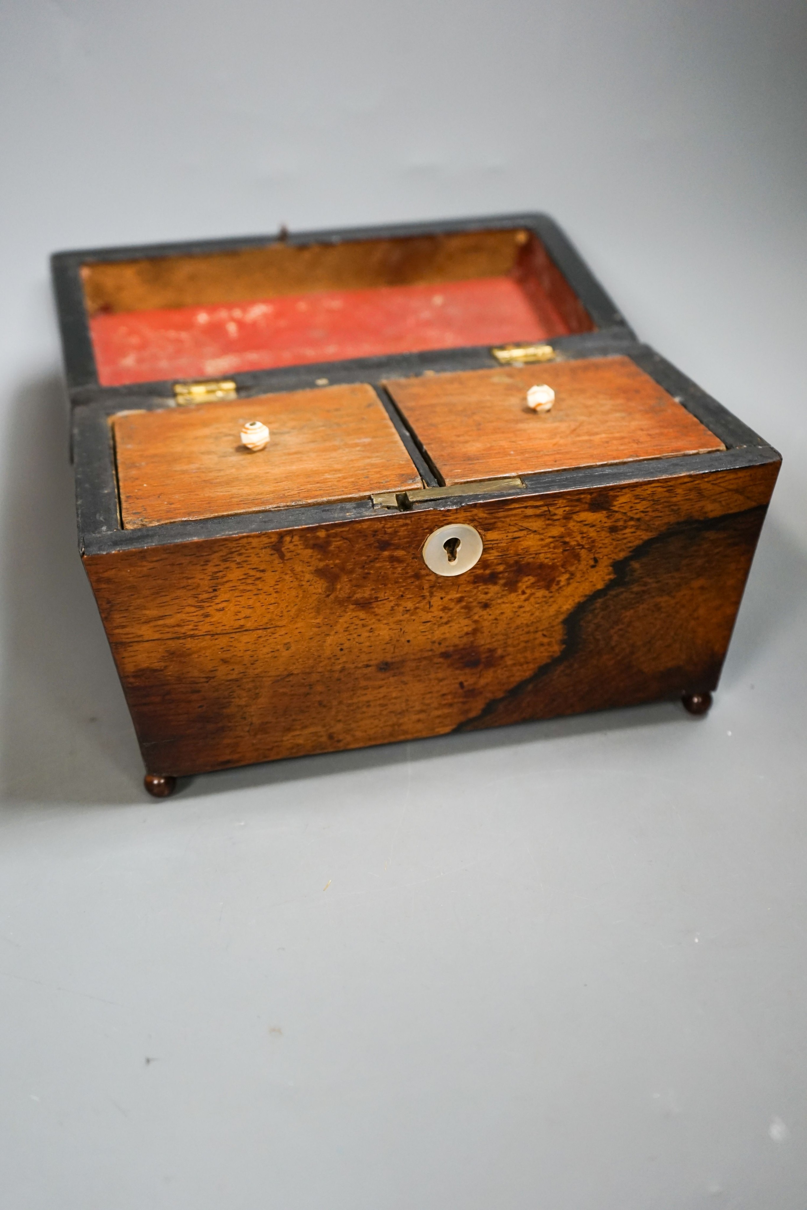 A bronzed metal greyhound, an Edwardian oak letter rack and a sarcophagus tea caddy.